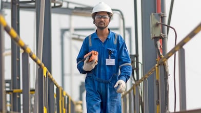Shell  technician going to test product for selective catalytic reduction.