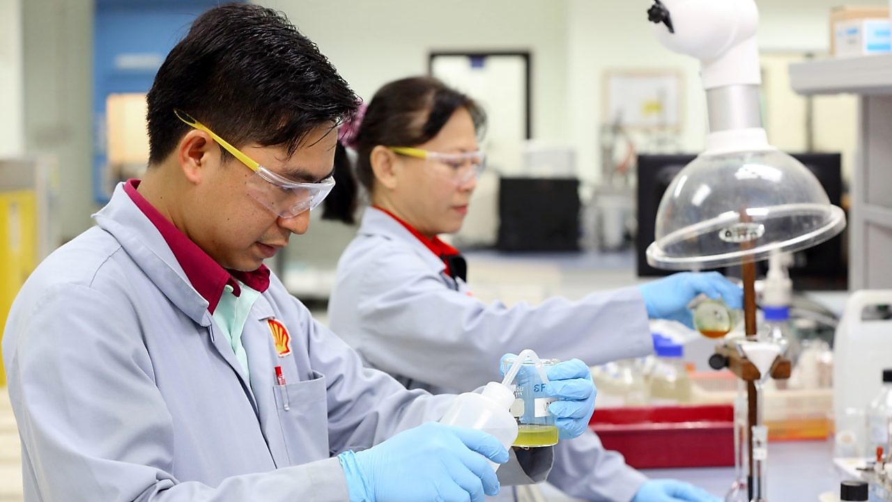 Lab technicians working in the Production Chemistry Lab