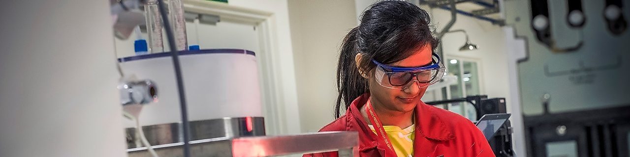 A worker at a manufacturing centre developing refining catalysts
