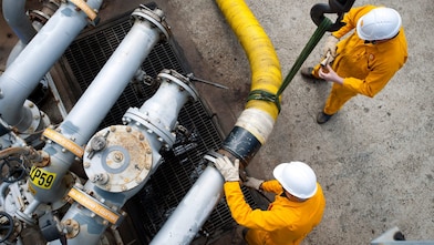 Aerial view of two Shell employees.