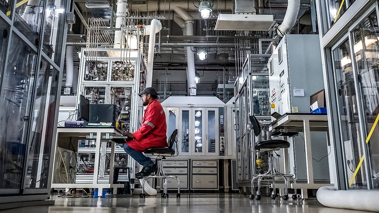 Shell Technology Centre, Bangalore. A Shell scientist working at computer Bangalore, India, 2018