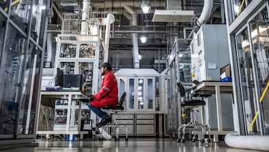 Shell Technology Centre, Bangalore. A Shell scientist working at computer Bangalore, India, 2018