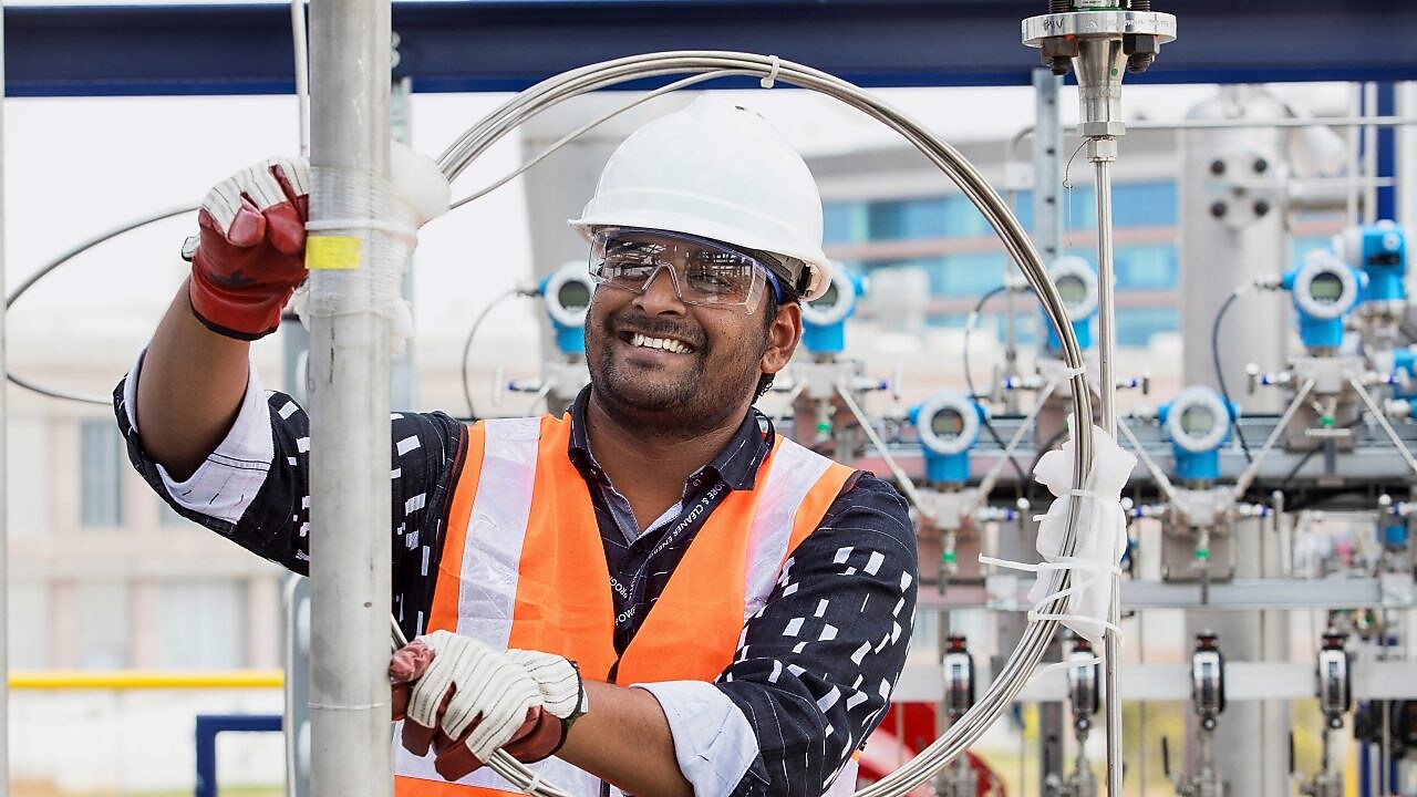 Shell employee operating advanced biofuel technology in pilot plant