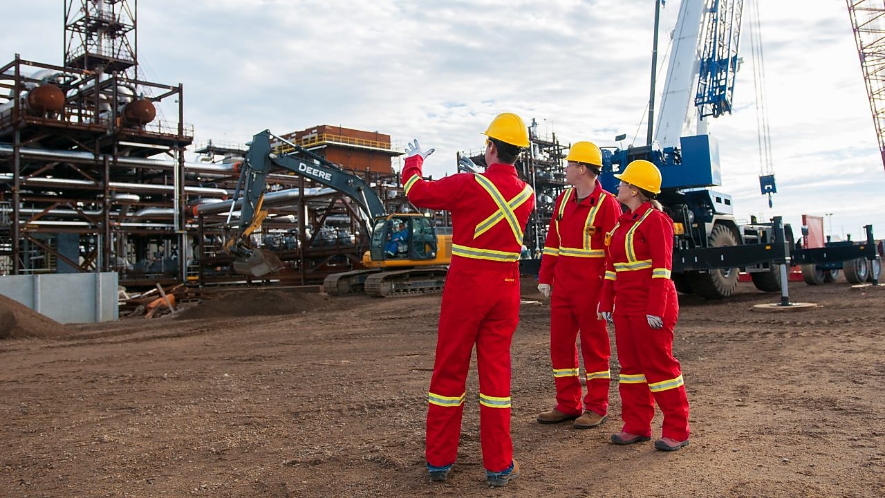 Claus process operatives carrying out inspection checks
