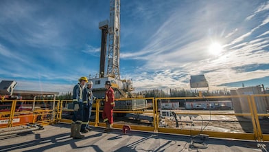 Shell gas processing three shell employee working