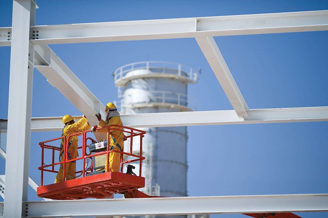 Employees conduct exploration of natural gas purification plant