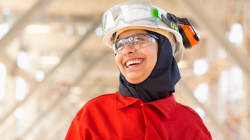 Shell employee smiles at the Effluent Treatment plant using the OMEGA process