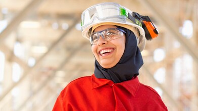 Shell employee smiles at the Effluent Treatment plant using the OMEGA process