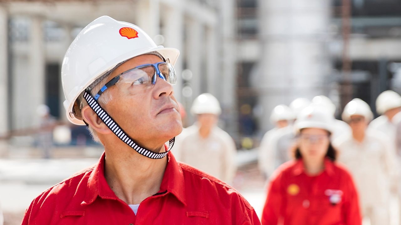 Crude oil processing worker at plant