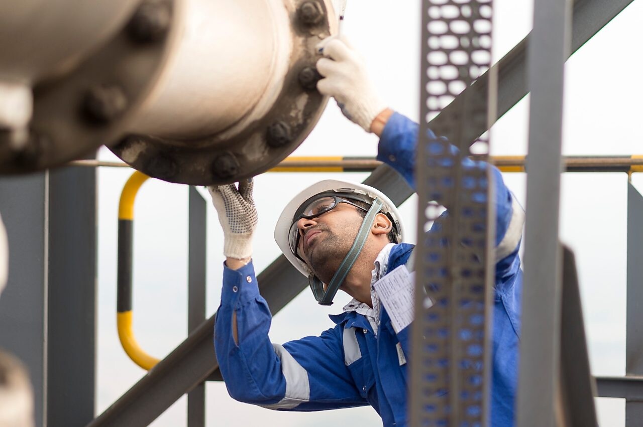 Employee inspecting gasification technology