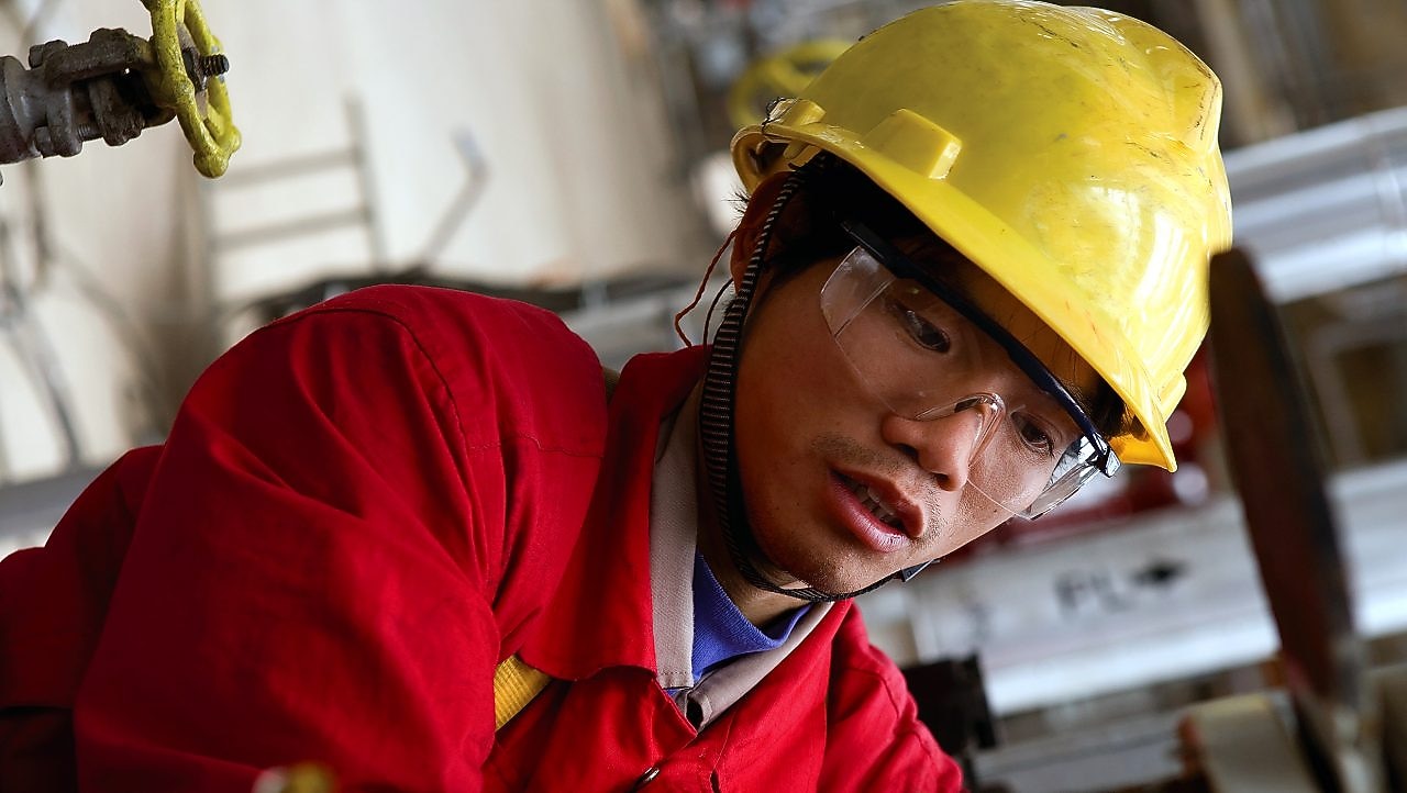 Shell employee working working on Gasification equipment