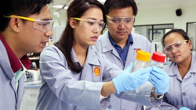 Hydrocracking scientist monitors the temperature that turns wax into oil