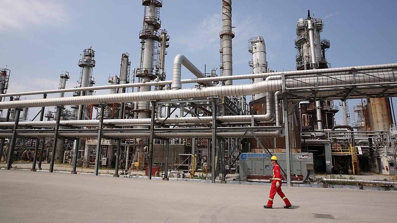 Shell Sarnia worker walks by the fluidised catalytic cracking unit