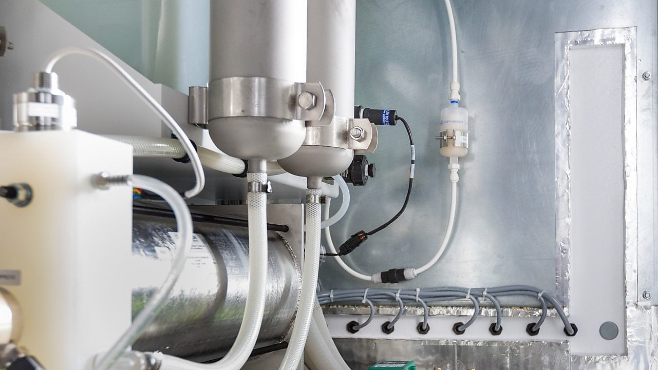 A Shell employee maintains an FCC unit.