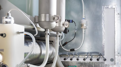 A Shell employee maintains an FCC unit.