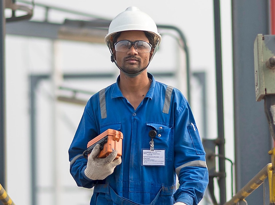 Shell technician going to test product for selective catalytic reduction.
