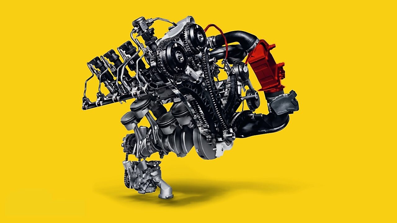 黄色背景下的涡轮增压发动机空气压缩机