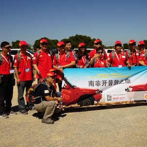 Group of people holding Shell Campaign banner
