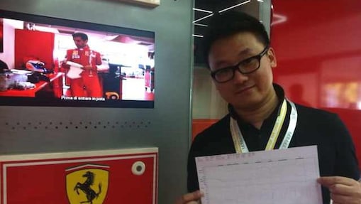 Person with holding certificate and medals