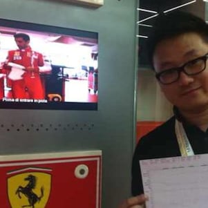 Person with holding certificate and medals