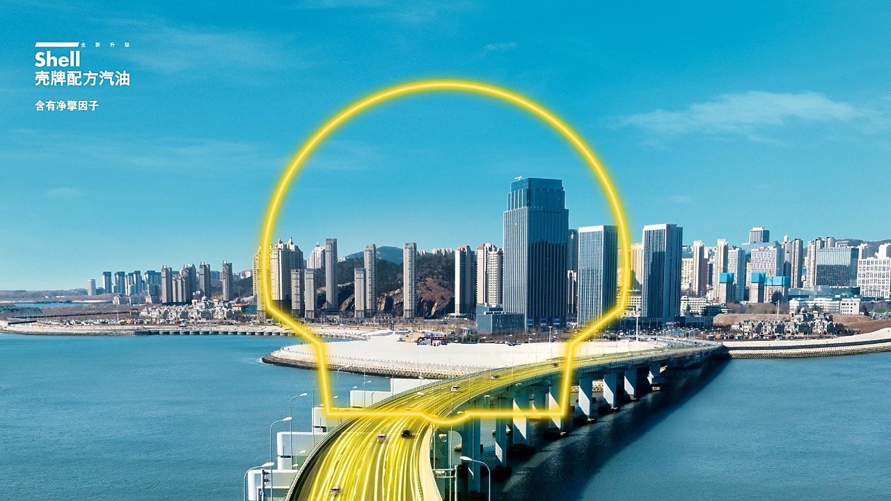 customer in front of shell retail station